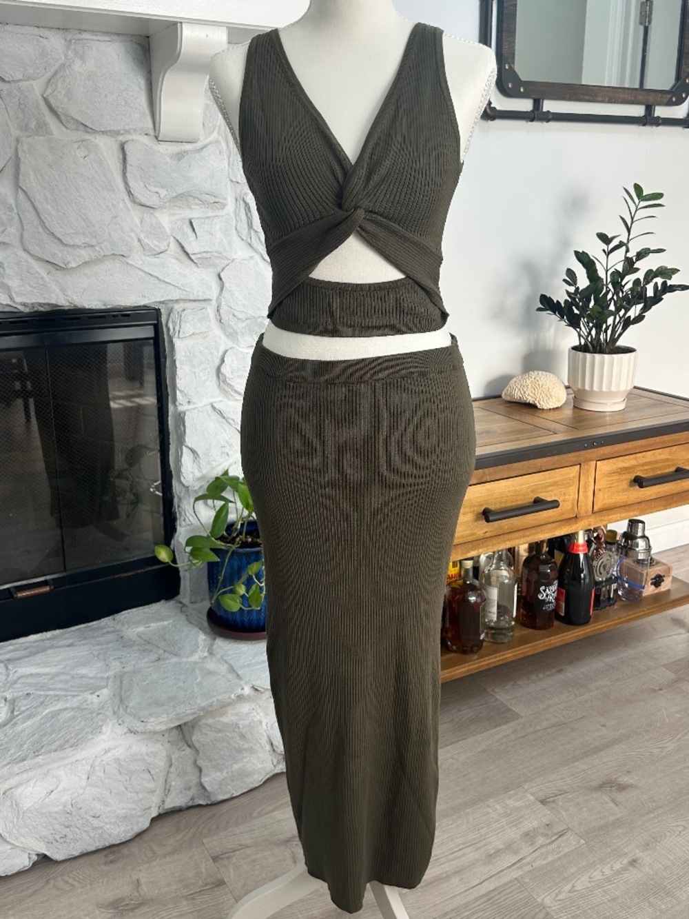Olive green ribbed knit set. Reversible twist crop top and low rise midi skirt